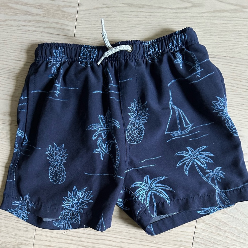 Boys stylish cut swim shorts.